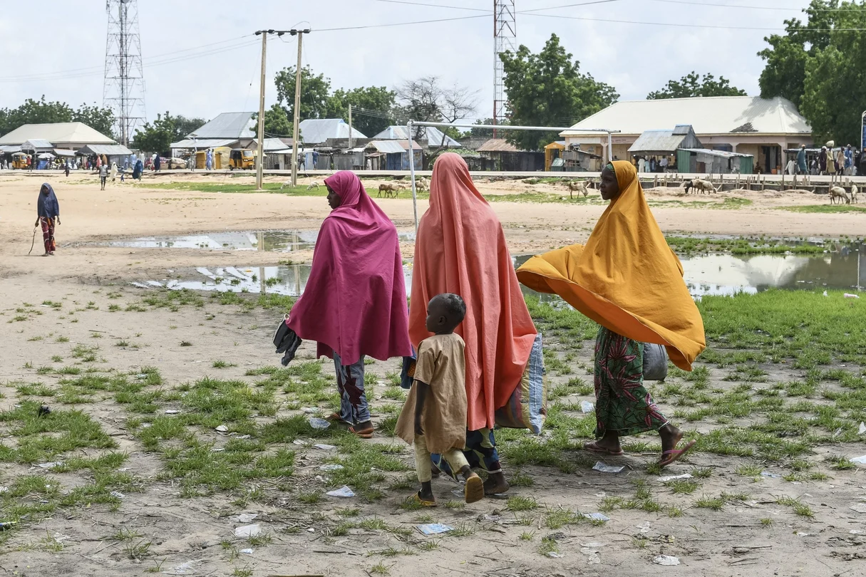 Survivors and relatives of victims gather in Babban Gide following a suspected Boko Haram attack. At least 81 lives were lost in the assault, with additional individuals still unaccounted for after the suspected jihadist strike in Yobe State, northeastern Nigeria.