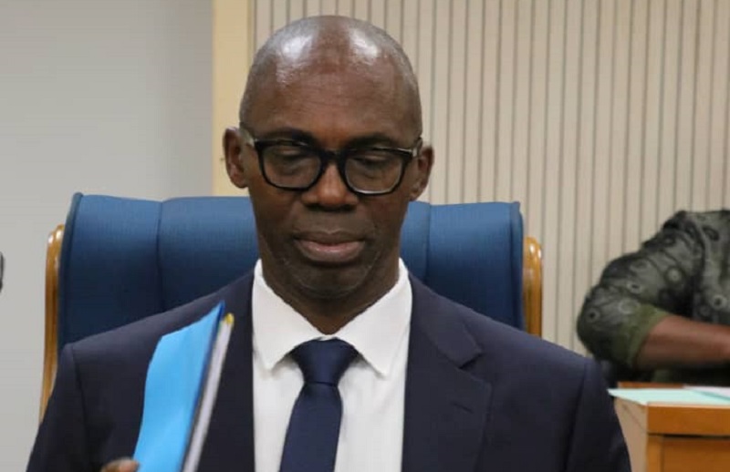 Government officials reviewing budget documents