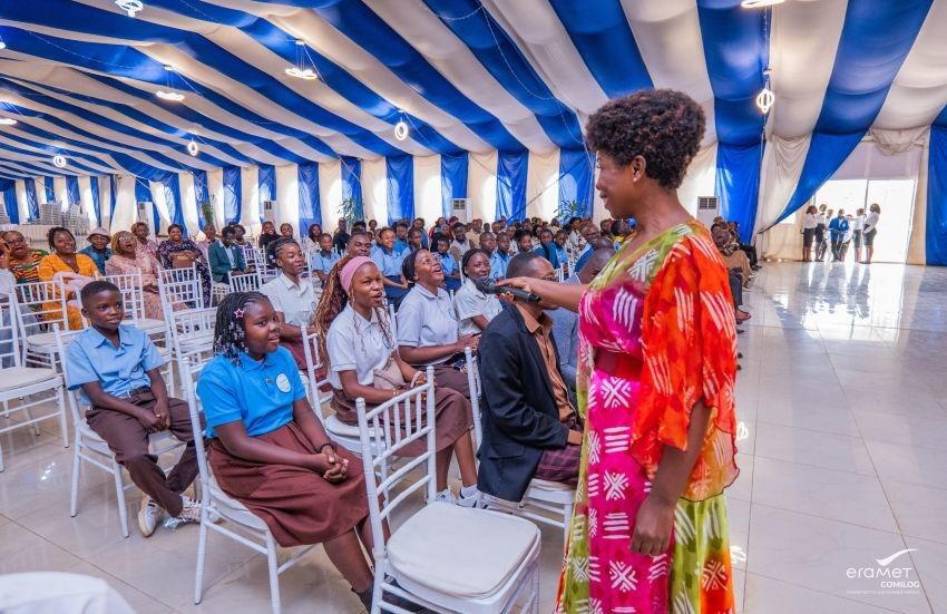 Students awarded in Moanda receiving recognition at Comilog