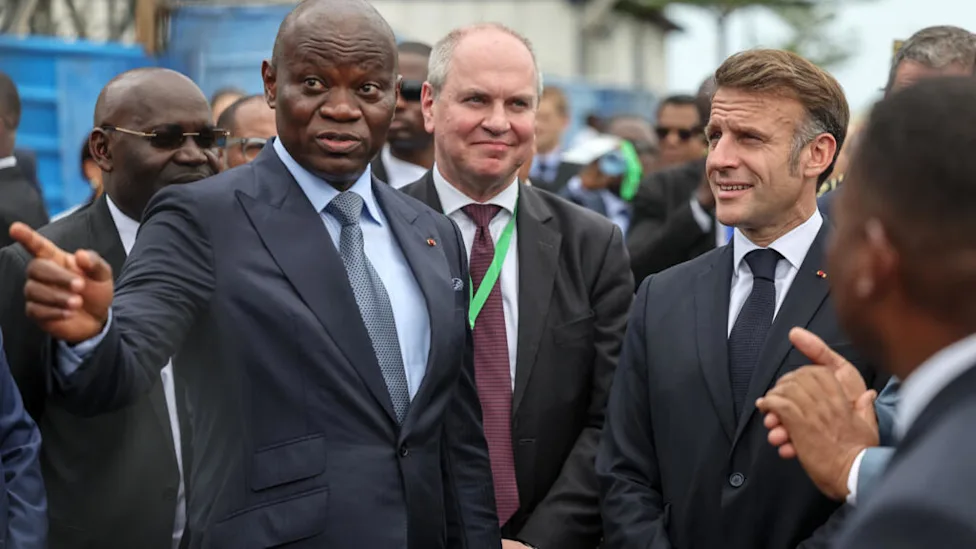 Gabonese President Brice Oligui Nguema shaking hands with French counterpart during official visit