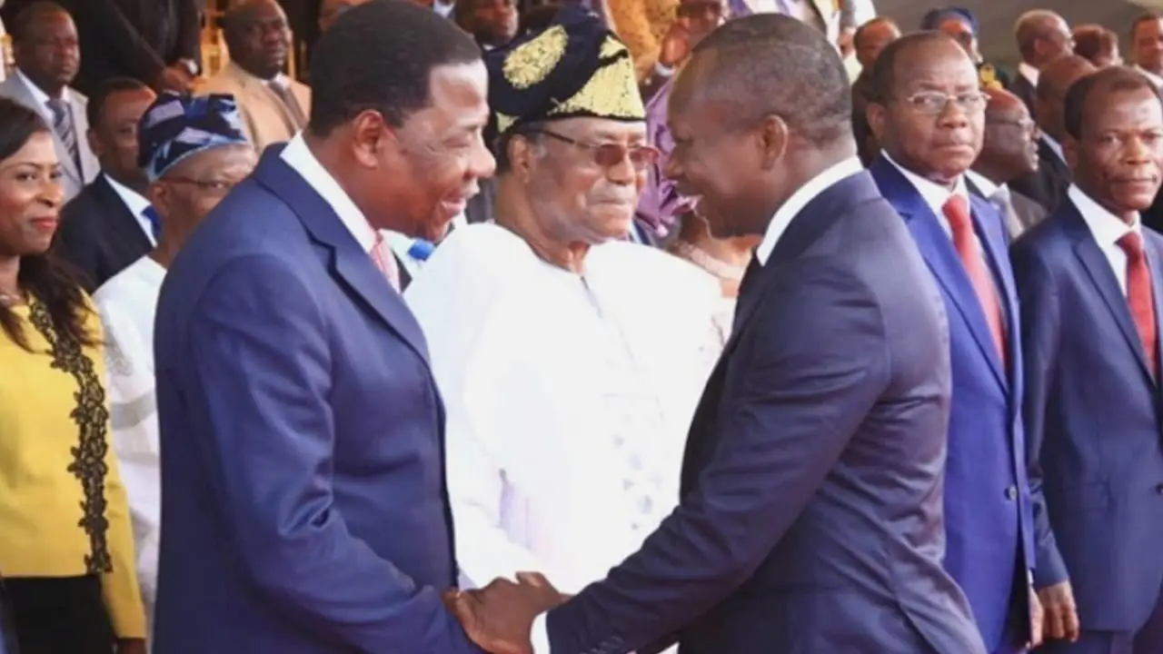 Former presidents Nicéphore Soglo (background in white), Boni Yayi (left) and Patrice Talon (right)