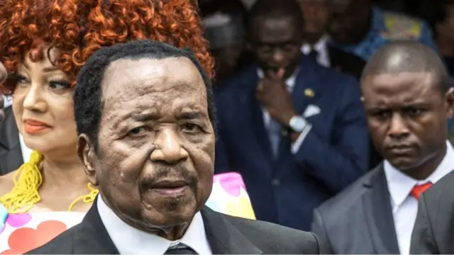 Paul Biya during one of his last public appearances in Cameroon, during the visit of Pope Leo XIV in April 2026. He is surrounded by Cameroonian officials and his wife, First Lady Chantal Biya.