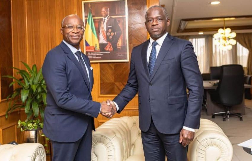 Gabonese and Monegasque officials shaking hands at a climate partnership meeting